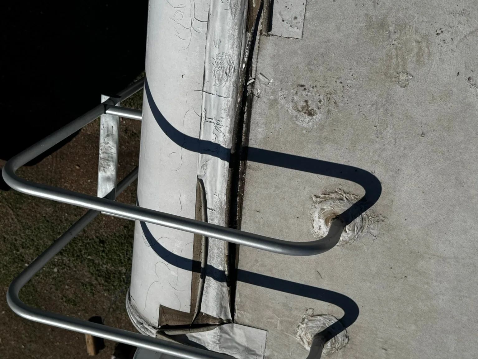 Slide topper roller tube and arm on the side of an RV, RV awning repair and replacement