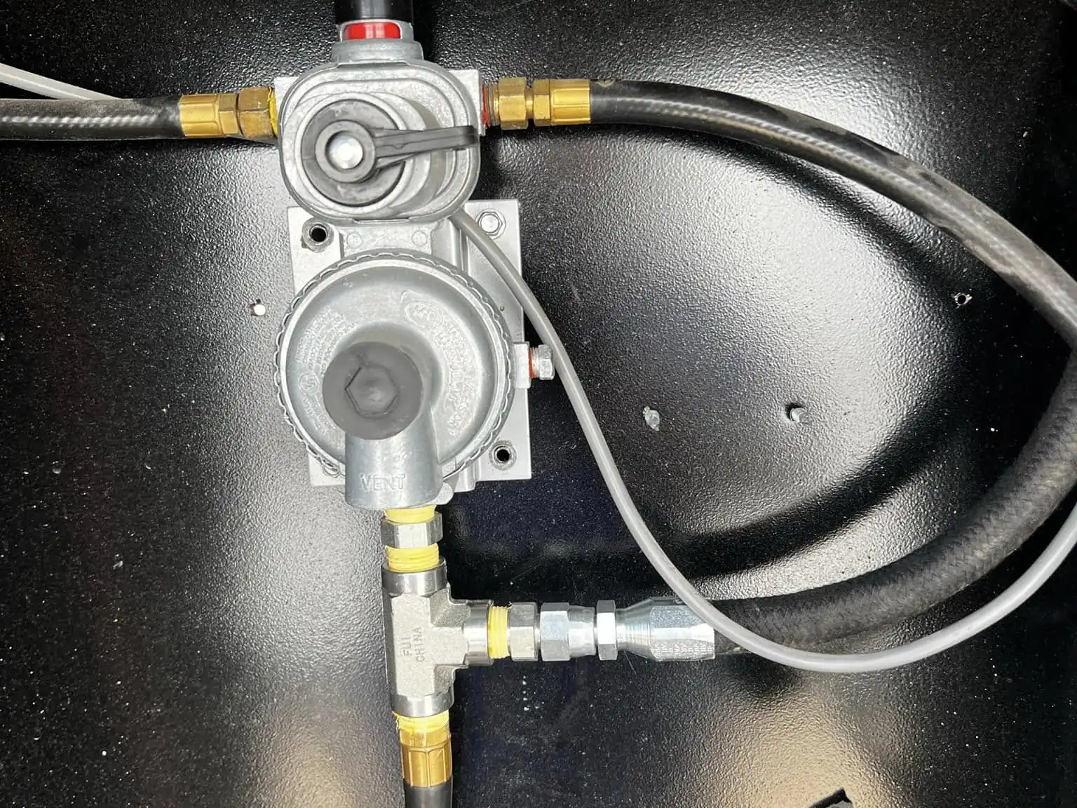 RV propane regulator and lines in the tank compartment, RV propane system service