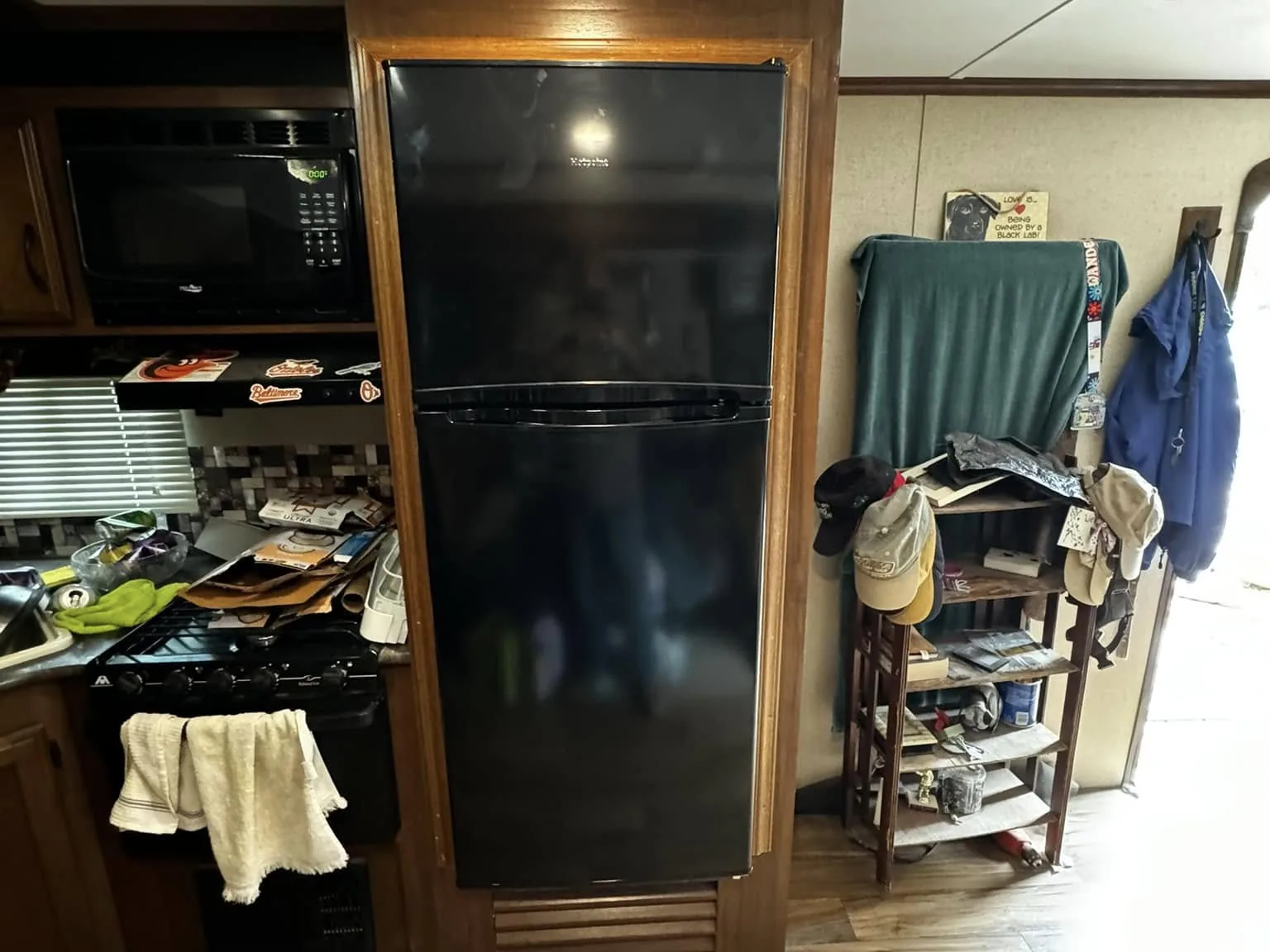 New RV refrigerator installed in a travel trailer kitchen, RV refrigerator repair