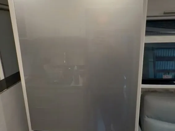 Replacement RV refrigerator standing ready to go in, RV refrigerator repair
